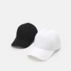 Pier One UNISEX 2 PACK - Cap - Black/white -Pier One c81afa5f2a2041ba9384bf535a217551